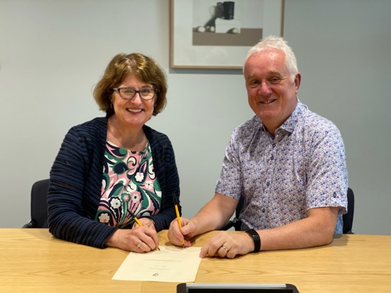 Marie Kennedy (Chairperson) and John Hanily (Board member) sign the Social Workers Registration Board Approved Qualifications Bye-Law 2022 Marie Kennedy (Chairperson) and John Hanily (Board member) sign the Social Workers Registration Board Approved Qualifications Bye-Law 2022
